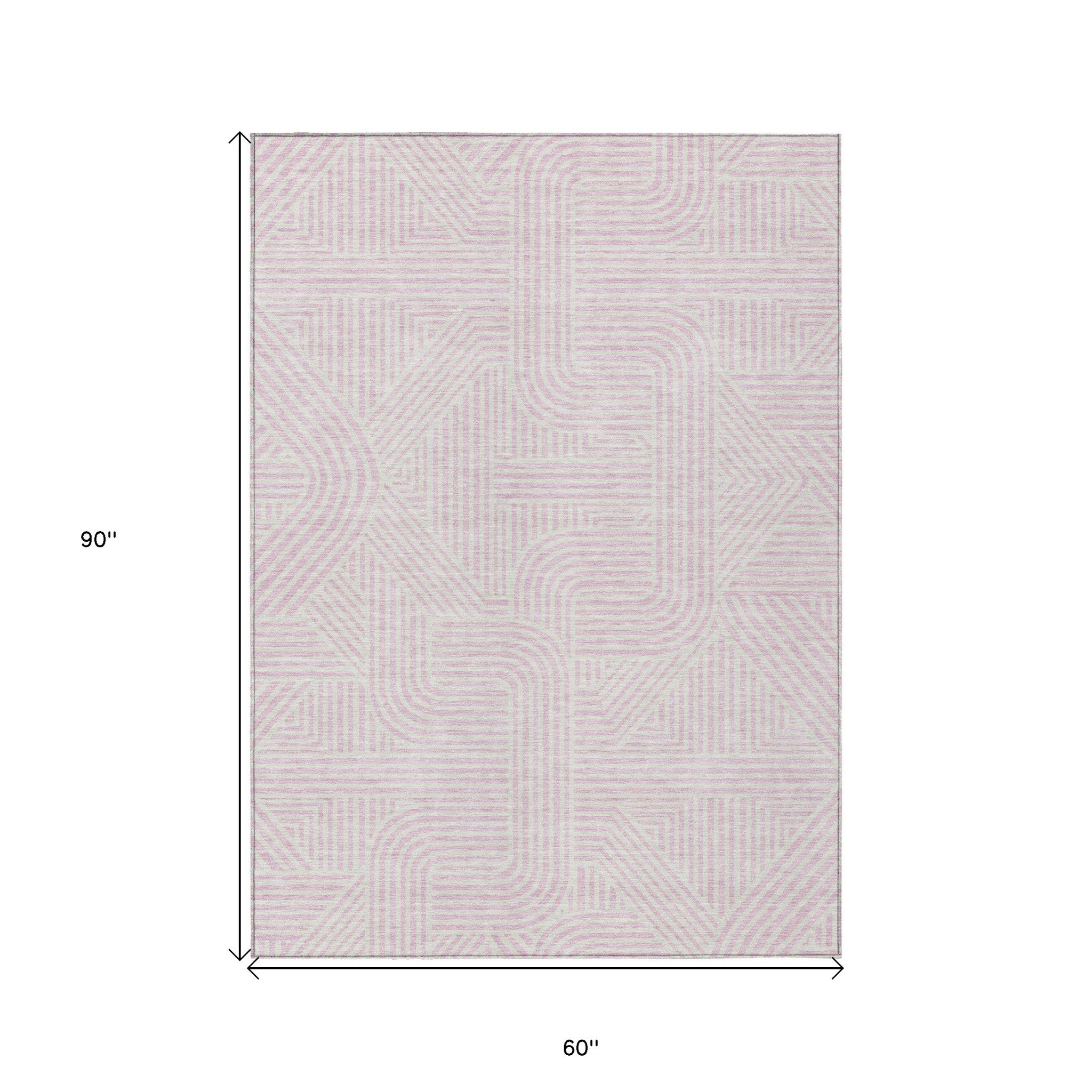 5' X 8' Pink And Ivory Abstract Washable Indoor Outdoor Area Rug